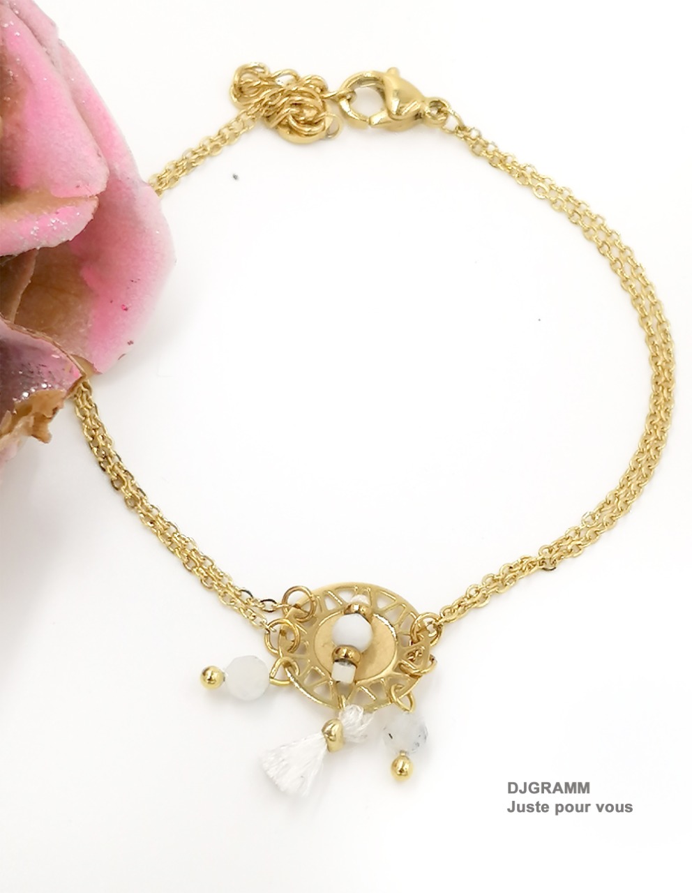 Bracelet en acier inoxydable style attrape rêve perles et pompon blancs